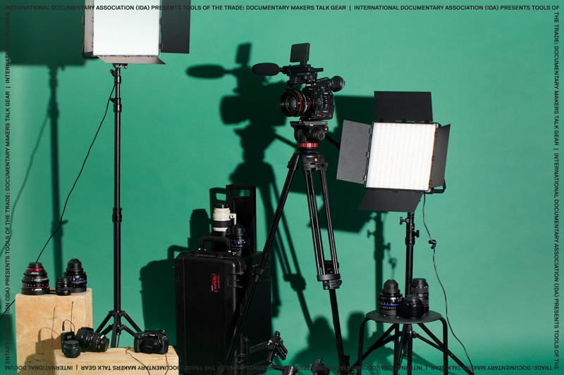 cine cameras and lenses in front of seamless paper background