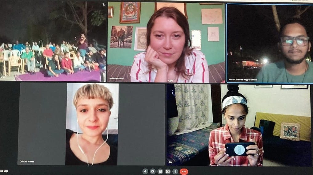 Zoom screen showing an outdoor audience, three filmmakers, and a moderator.