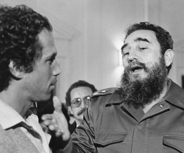 Jon Alpert, a man with short dark hair, interviewing Cuban President Fidel Castro, a man with dark hair and a long beard. A still from 'Cuba: The People'. Courtesy of DCTV