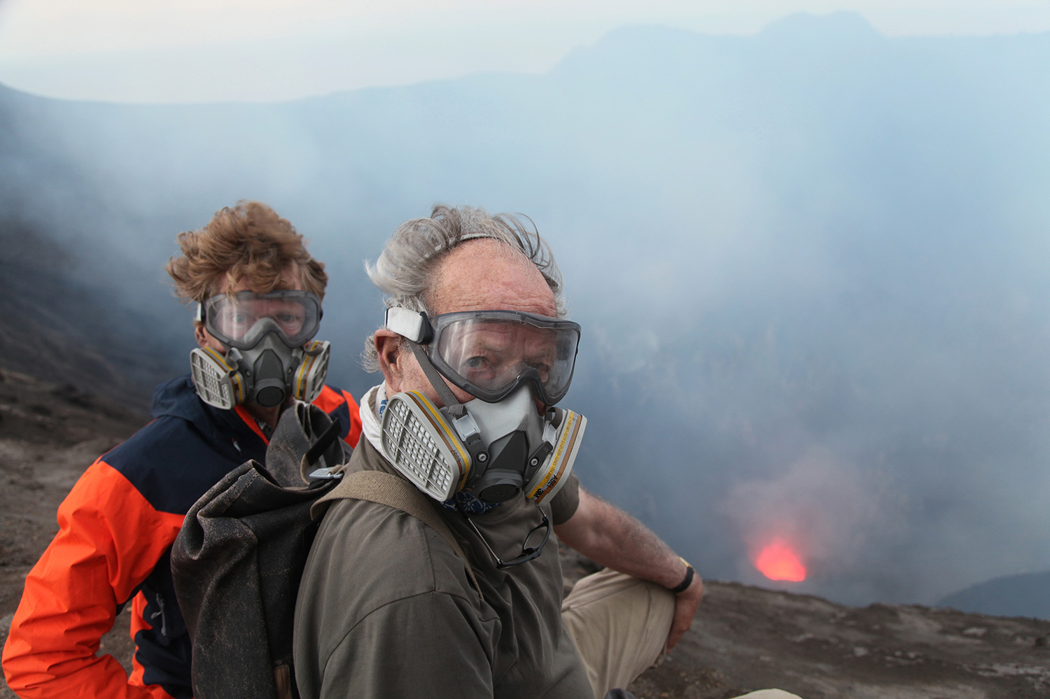 Volcanologist Clive Oppenheimer (left) with filmmaker Werner Herzog in Indonesia during the making of Herzog's 'Into the Inferno,' on location in Indonesia. Courtesy of Netflix