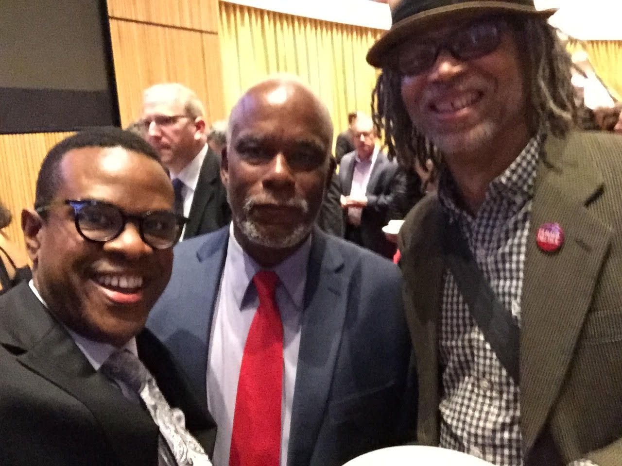 (L-R): Thomas Allen Harris, Stanley Nelson, Lewis Erskine at the 2016 Emmy Awards. They are posing for a selfie. Courtesy of Thomas Allen Harris. 