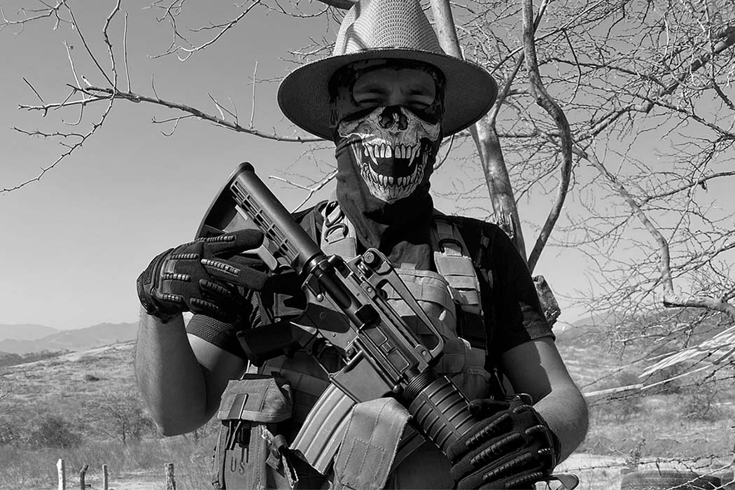 A Sicario from Jalisco Cartel, guarding his territory. Photo courtesy of Miguel Angel Vega