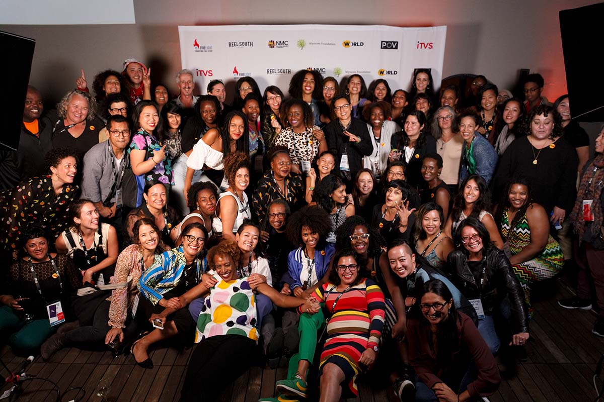 Members of Brown Girls Doc Mafia strike a pose with industry colleagues at Getting Real 2018. Courtesy of PBS Indies