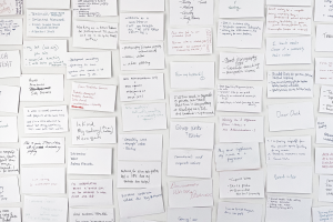 Photograph of a wall of index cards.