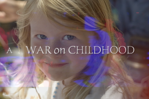 A toddler sitting in nature stares at the camera, the title of the documentary across her face "A War On Childhood".