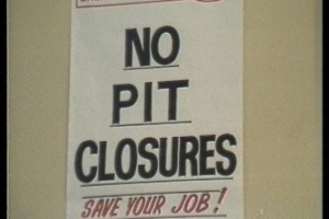 Image of a sign that reads: "No Pit Closures Save Your Job!"