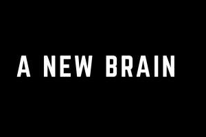 "A NEW BRAIN" in white text in front of a black background