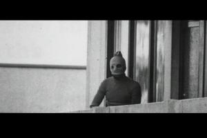 A black-and-white photo of a person wearing a ski mask from 'One Day in September'