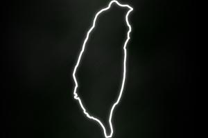 White outline of Taiwan over black