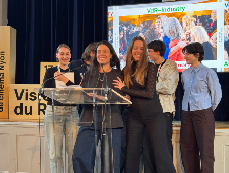 A group of women congratulate the festival's head of industry.