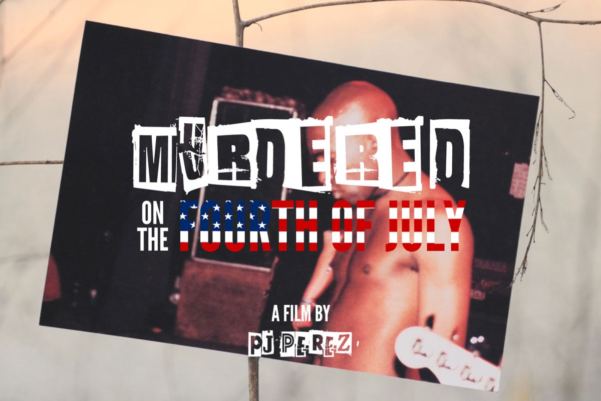 Still image from a film featuring a photo of a shirtless young Black man with a bald head. The photograph is balancing on a narrow branch. The words "Murdered on the Fourth of July, a Film by Pj Perez" are superimposed on the still image.