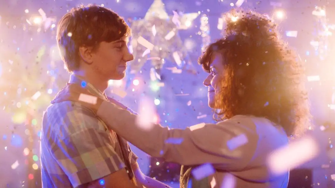 Photo credit: Brennan Vance. Film: You Were My First Boyfriend. Two people dancing with confetti falling around them.