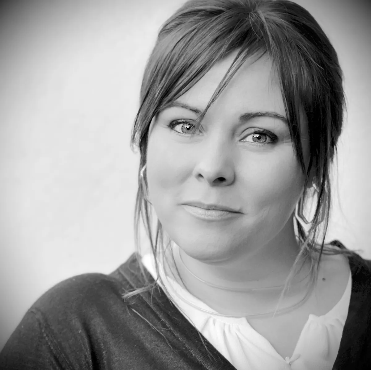 black and white headshot of a woman