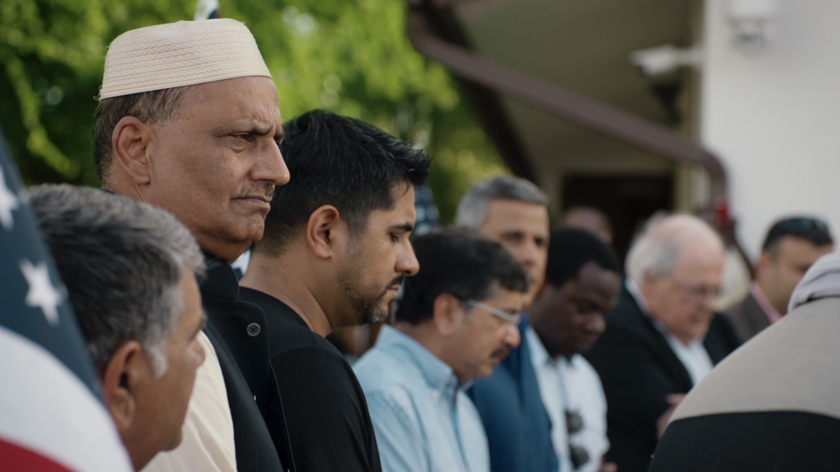Victoria Islamic Center members gather for the groundbreaking ceremony for their new mosque, in episode two of A Town Called Victoria.