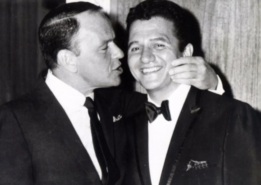 Buddy Greco with Frank Sinatra giving him a kiss on the cheek