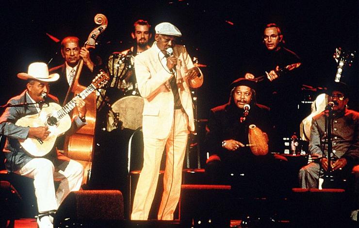 A group of musicians onstage, from Wim Wnders' 'Buena Vista Social Club' on stage.