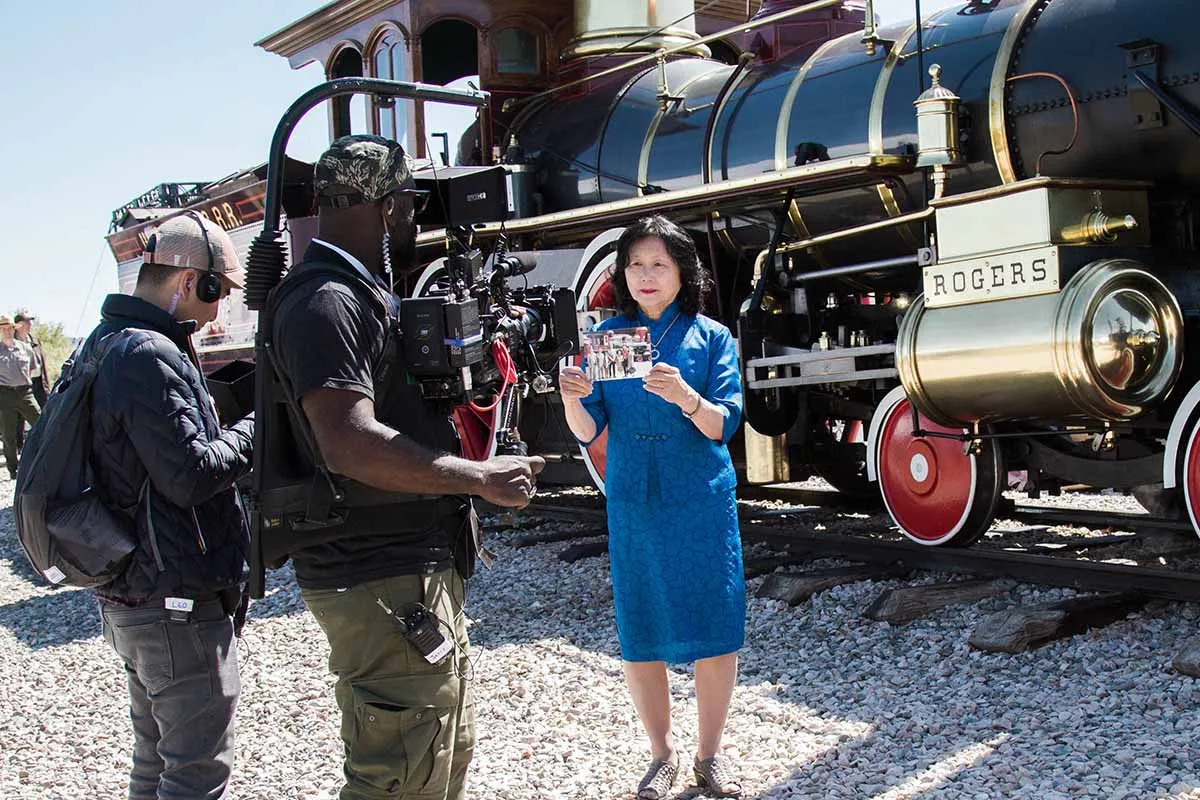 Filmmakers Leo Chiang (left) and Jerry Henry filming Connie Young Yu, an Asian American historian, for the PBS documentary series Asian Americans. Courtesy of WETA and CAAM