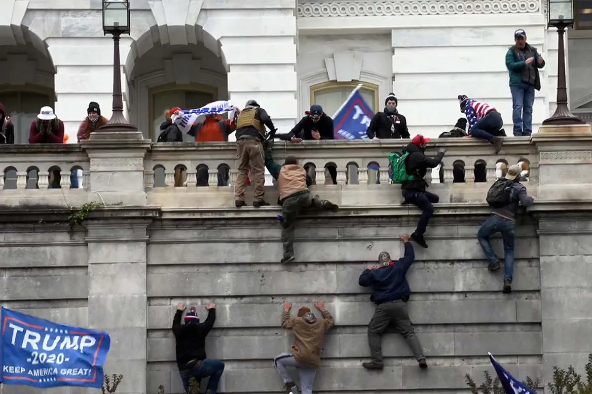 A group of Trump supporters storm the US Capitol Building on January 6, 2022. From The New York Times Visual Investigations’ 'Days of Rage. 'Courtesy of The New York Times