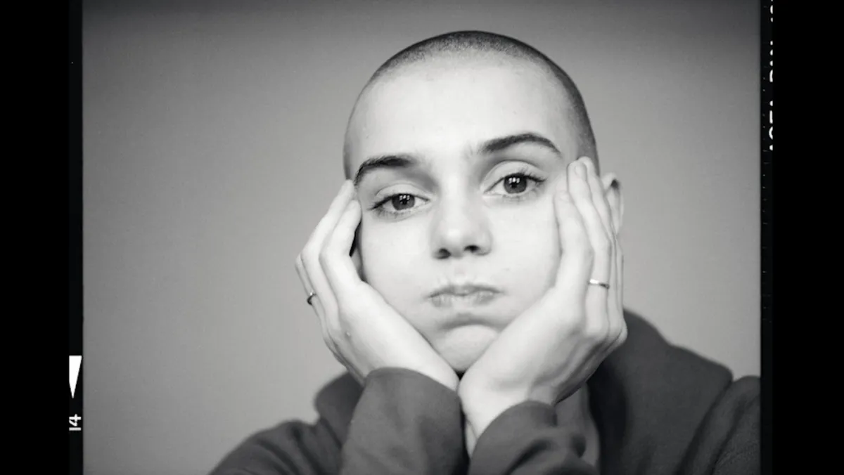 Sinéad O’Connor in a black and white photo.