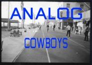 'Analog Cowboys' is written in blue above a picture of a street in Southern California.