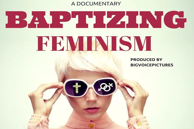 A young Caucasian woman with a pixie cut adjusts her black sunglasses with white frame. There is a cross symbol in her left sunglass shade and gender symbols in the right sunglass shade. 