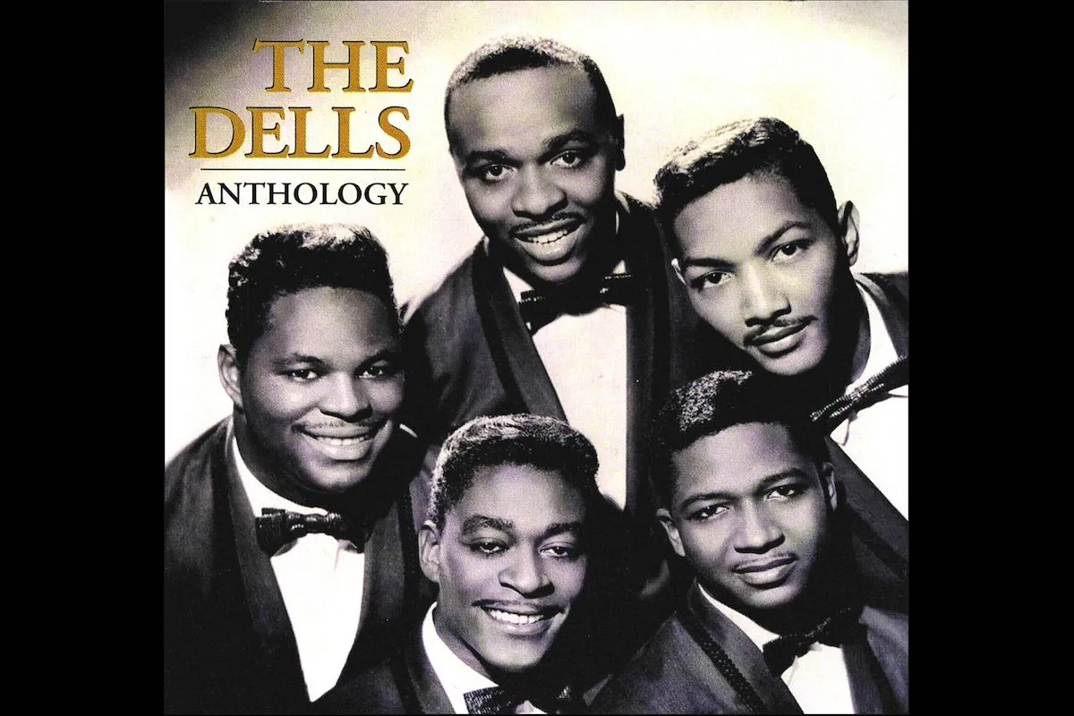 black and white album cover showing five african-american men in suits leaning into the picture