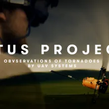 First Person View Drone Pilot Flying a 3D Printed Drone Towards a Large Cone Tornado