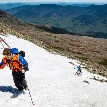 On the highest peak in the North East, Dusty and his father Arie, go for few spring time ski runs on the snowfields of Mount Washington on the first production day of the project.