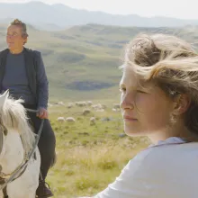 TO HOLD A MOUNTAIN film still_Gara & Nada in field