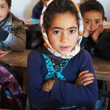 A group of Indigenous Moroccan school children sit at their desks in a classroom. From Mohamed El Boudi’s 'School of Hope', courtesy of Hot Docs.