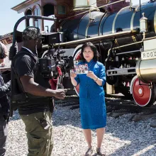 Filmmakers Leo Chiang (left) and Jerry Henry filming Connie Young Yu, an Asian American historian, for the PBS documentary series Asian Americans. Courtesy of WETA and CAAM
