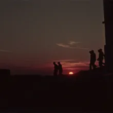 Silhouettes of six men against a setting sun. Image from Vittorio de Seta's 'Solfatara.' Courtesy of The Criterion Collection