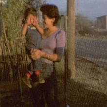 Still from Super 8mm video footage of a young Jasmin Mara López held by her mother, Sandra. From Jasmin Mara López’s ‘Silent Beauty.’ Courtesy of Hot Docs.
