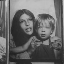 A black-and-white photo booth shot of a mother holding her toddler.  Images from Jonathan Caouette’s Tarnation. Courtesy of Wellspring Media