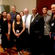 group photo of Jai Tiggett, Deb Esquenazi, Sonya Childress, Renee Tajima-Peña, Steve James, Anna Vasquez, Simon Kilmurry, Mohammad Mubarak, Jack Pettibone Riccobono, and Rob Brown.