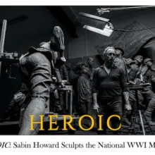 Sabin Howard stand in the middle of his sculpture studio surrounded by massive statues of charging soldiers.