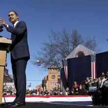 Julían Castro Stands on a podium before his supporters