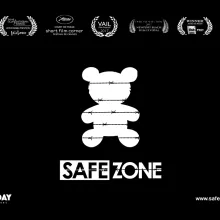 White silhouette of a teddy bear with barbed wire running across its body.