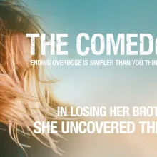 A woman with her hair flowing in the breeze.