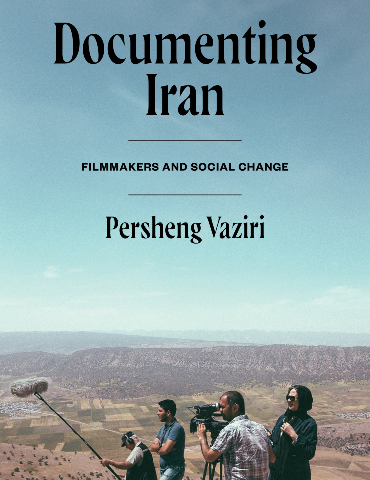 The cover of a book. The lower part of the image is a crew of four filmmakers shooting in an arid, mountainous area, with a large blue sky overhead where the words "Documenting Iran Filmmakers And Social Change Persheng Vaziri" are printed in black text